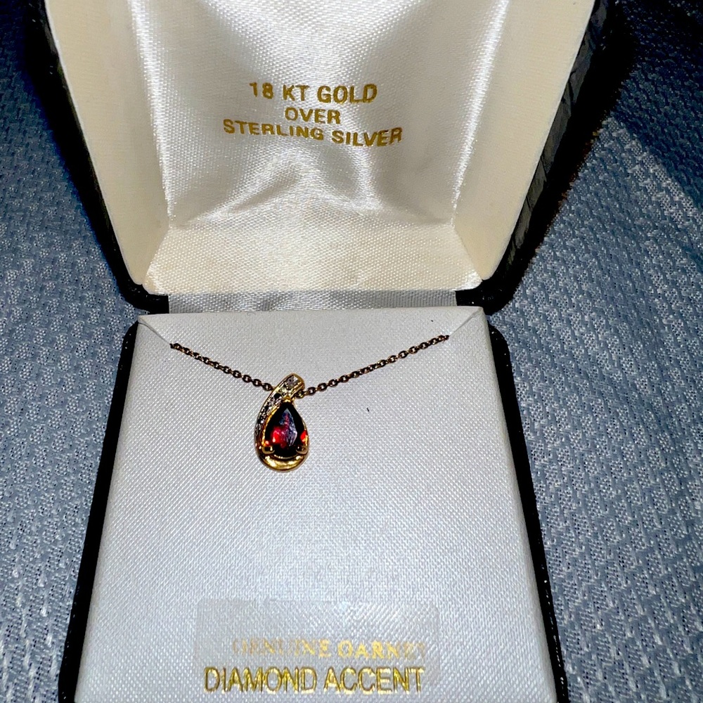 Garnet pendant with diamond accent